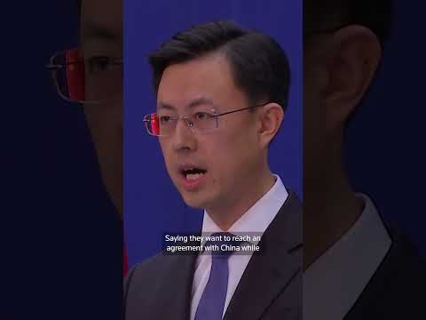 China says US should stop threats